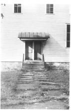 SA0230 - Shows the meeting house entrance door. Identified on the back., Winterthur Shaker Photograph and Post Card Collection 1851 to 1921c